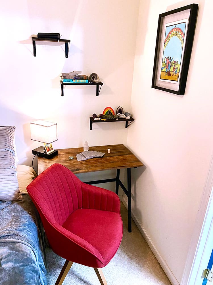 Small desk with a mid modern century swivel chair and shelves